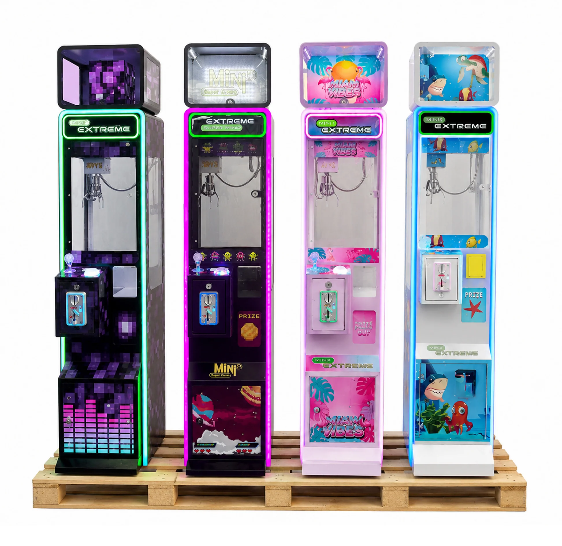 Four Mini Extreme claw machines displayed on a pallet